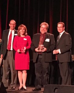 Bill & Linda Kleist with Murray Feldman, host of MichBusiness Awards 2016 at the MGM Grand in Detroit